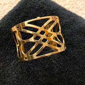 Adjustable gold toned cut out cuff